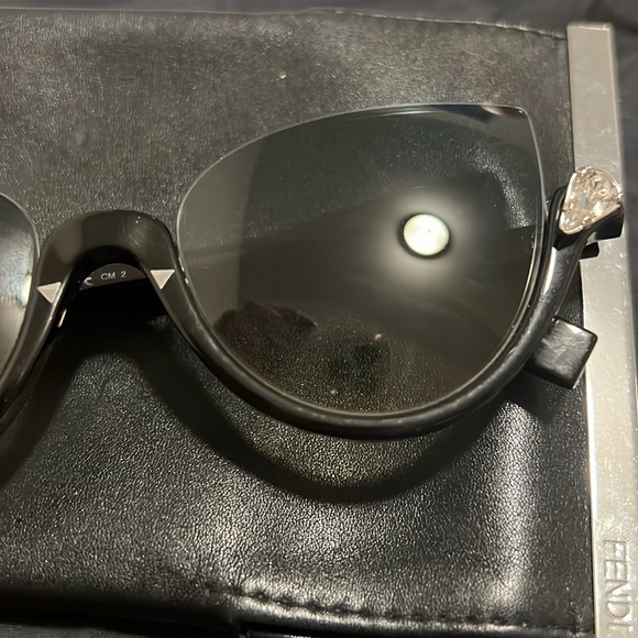 Worn few times has a small scratch on one of the lens  not noticeable - Picture 3 of 6